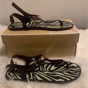 Micheal kors Plate Jelly sandals. Used size 8 runs small.